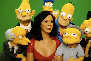 Illustration for article titled Katy Perry's breasts to spend Christmas with The Simpsons